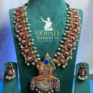 KAMAKSHI GUTTAPUSAL HARAM